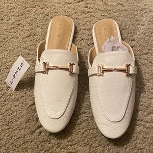 Shein shoes NWT they came with a blue stain (pictured)